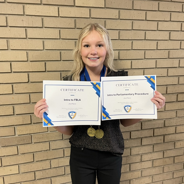 Aleigha White with her awards
