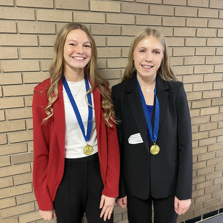 Claire Garland and Natalie Cook with their award medals