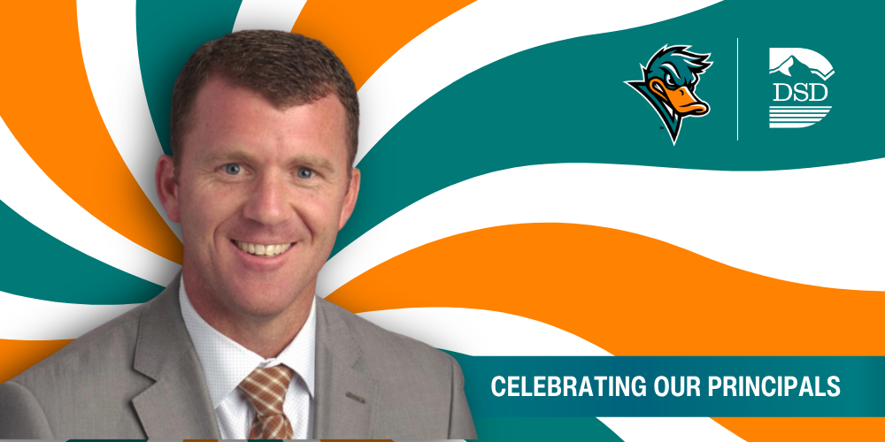 A principal in front of a wavy background with a banner that reads "Celebrating Our Principals"