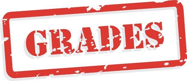 Red rubber stamp graphic with the word “GRADES” in bold, distressed capital letters inside a rectangular border, slightly tilted, on a white background.