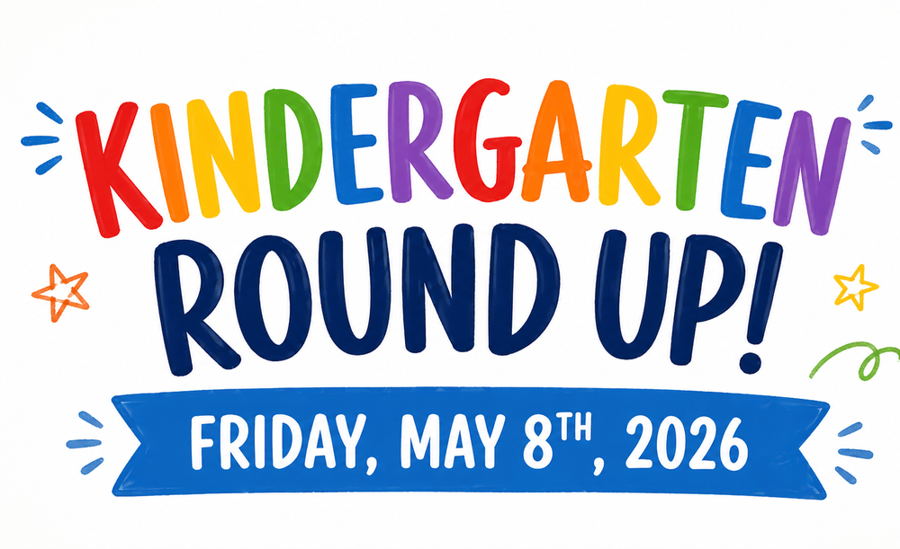 Simple, kid-friendly banner design with a white background. The title “Kindergarten Round Up!” is written in large, colorful, rainbow-style letters at the top. Below it, a blue ribbon banner displays the date “Friday, May 8th, 2026” in bold white text. Small doodles like stars and playful lines decorate the space around the text.