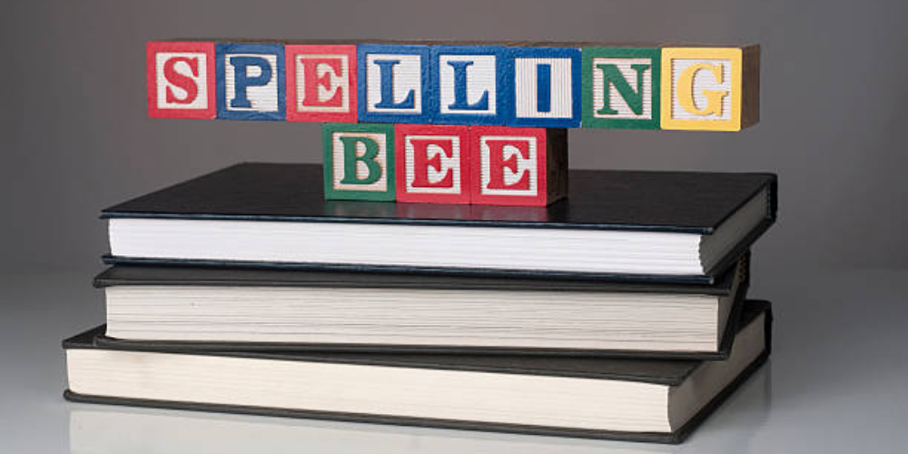 Spelling bee blocks on books
