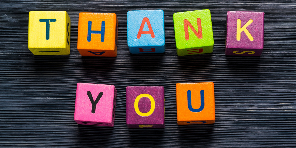 Thank you letters on multicolored blocks with gray background