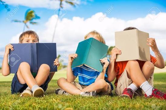 Kids reading outside