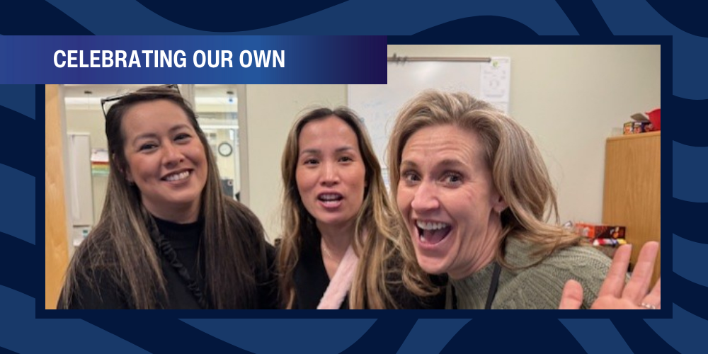 Third grade team smiling after hearing about reading scores improvment