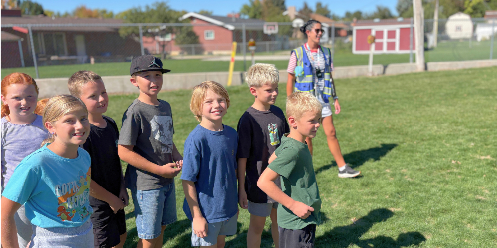 students line up for a playground game