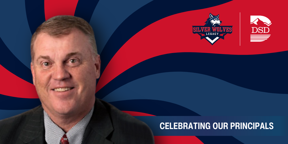 A principal in front of a wavy background with a banner that reads "Celebrating Our Principals"