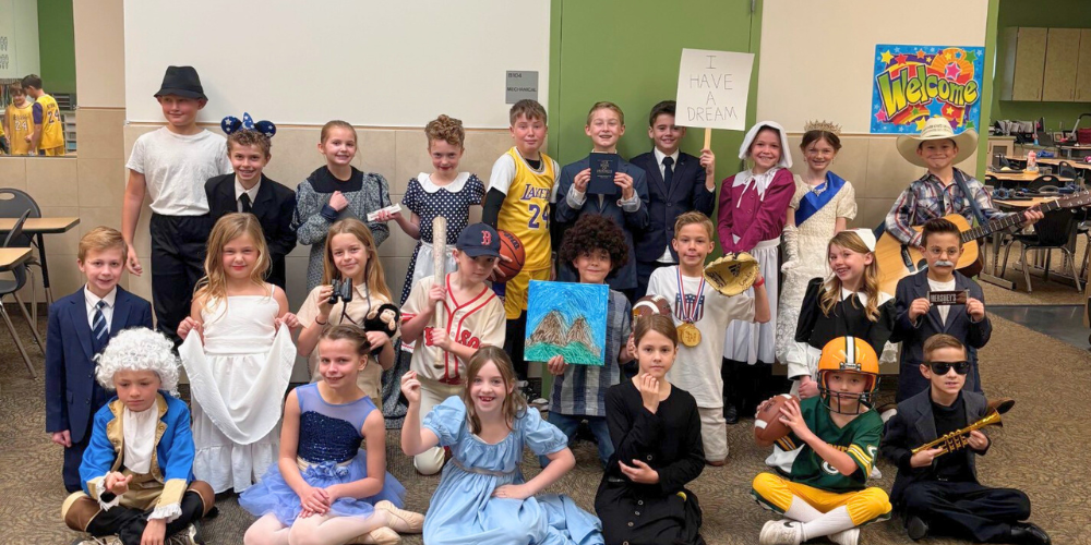 Students dressed in costume as historical figures 