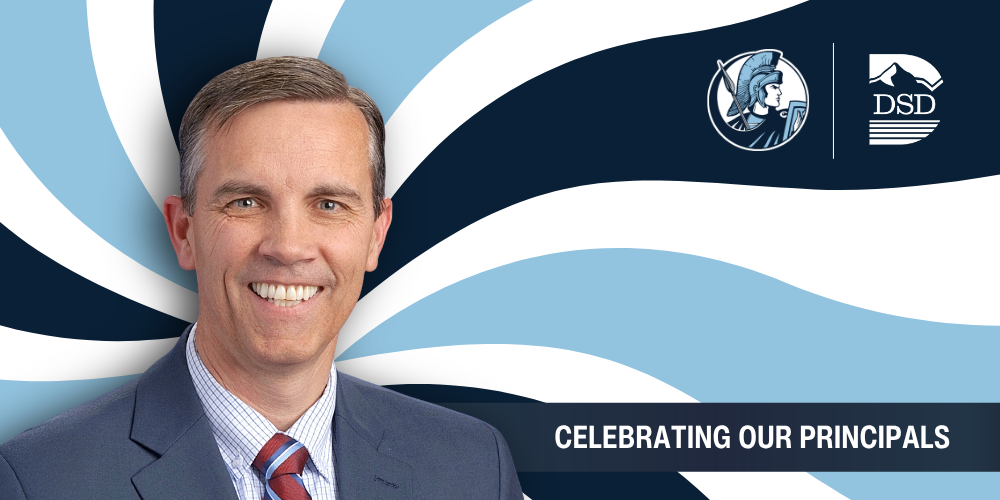 A principal in front of a wavy background with a banner that reads "Celebrating Our Principals"