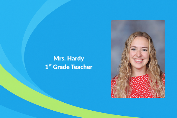 Mrs. Hardy 1st grade teacher photo of women with red top