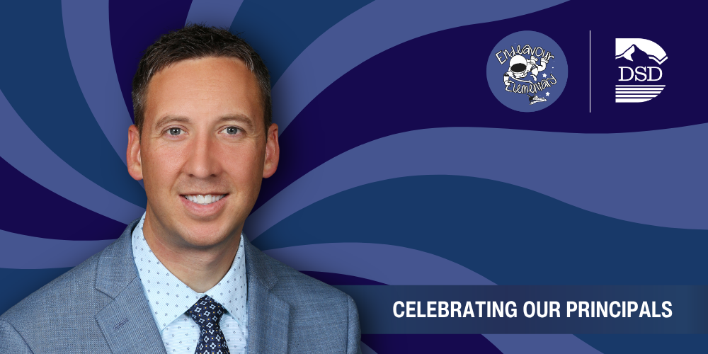 A principal in front of a wavy background with a banner that reads "Celebrating Our Principals"