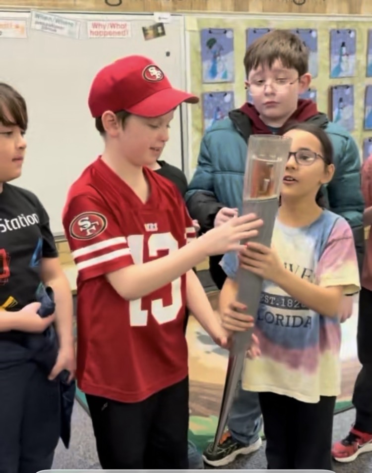 carrying Olympic torch 