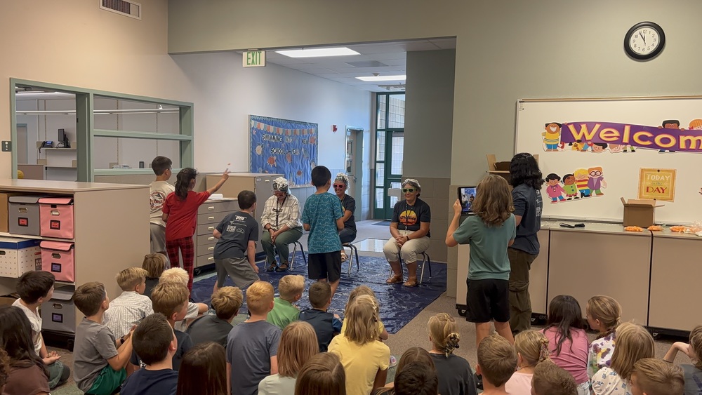 teachers and students laughing