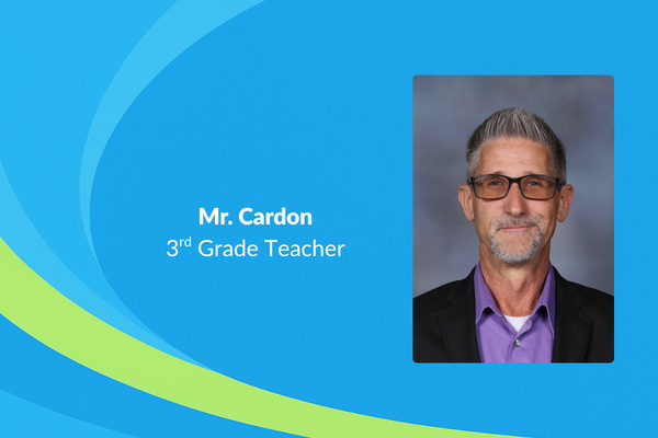 Mr. Cardon 3rd grade teacher picture of man in purple shirt and black jacket with glasses