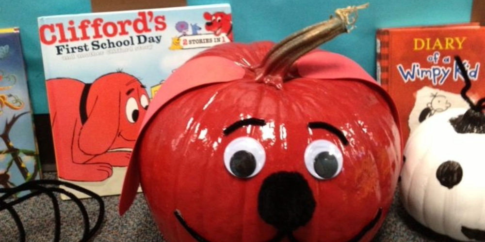 pumpkin decorated to look like Clifford the Big Red Dog