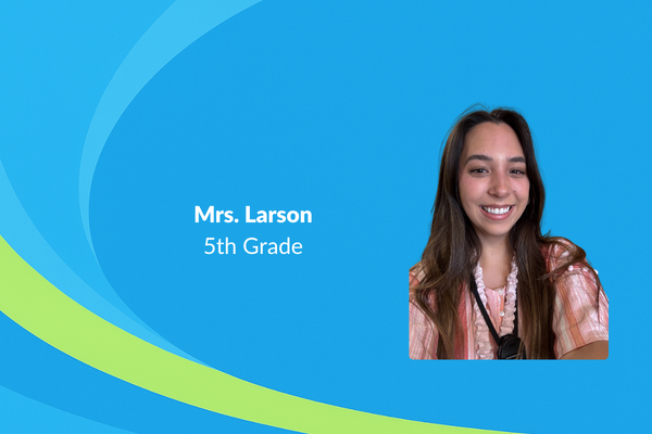 Mrs. Larson 5th grade picture of women with long brown hair and pink shirt