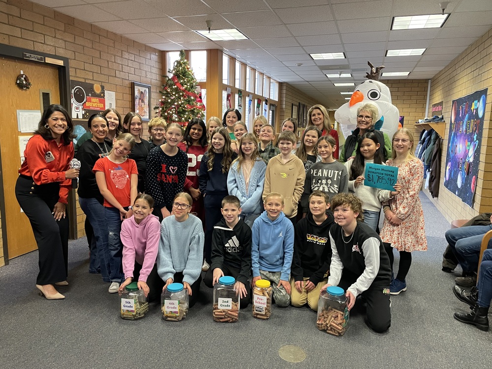 Student Council and Jr. Hope Squad students were featured on KSL as they presented the money we raised towards KSL's Quarters for Christmas campaign.  We were able to raise $1,785.92!