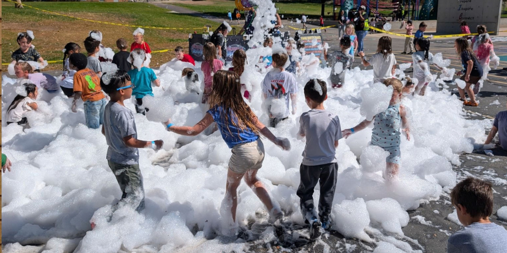 students playing in foam