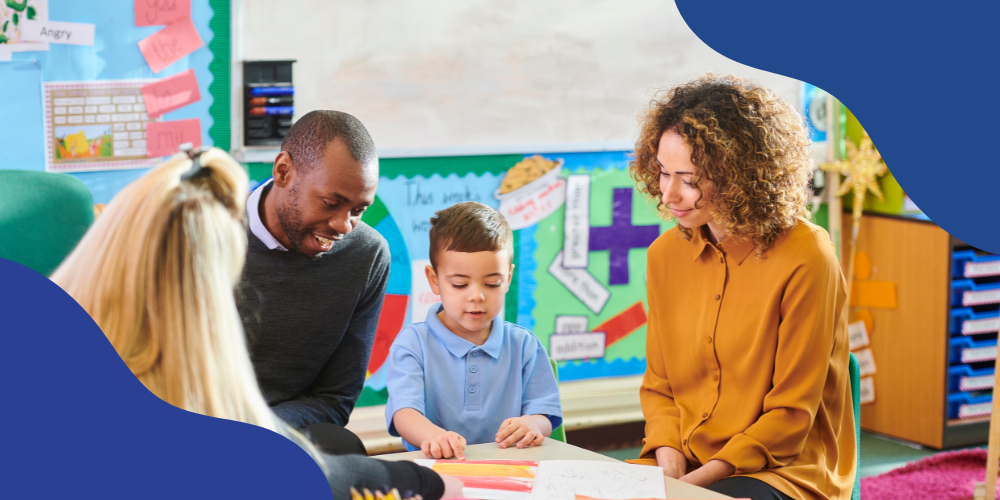 Parents, child, teacher at a conference