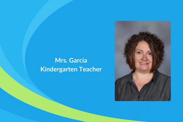 Mrs. Garcia Kindergarten teacher photo in grey shirt