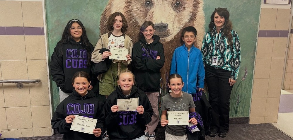 November Students of the Month Standing Together with Principal