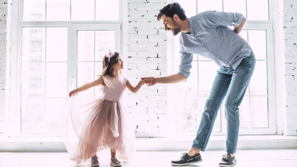 Daughter and Father dancing