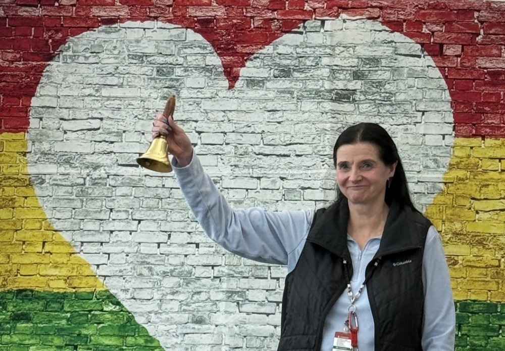 Marcia Flocken ringing her bell for retirement
