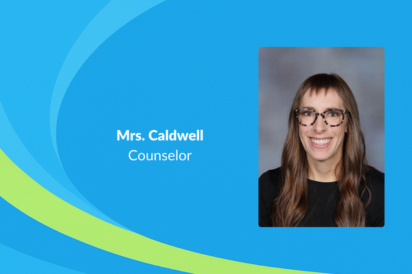 Mrs. Caldwell counselor picture of women with glass and curled brown hair and black shirt