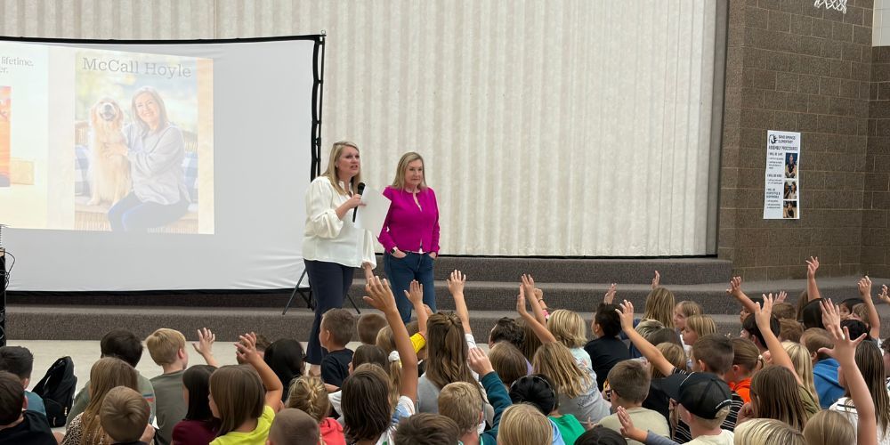 Our Librarian, Mrs. Brady and Author McCall Hoyle talking to students