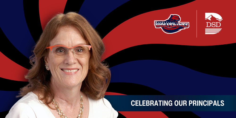 A principal in front of a wavy background with a banner that reads "Celebrating Our Principals"