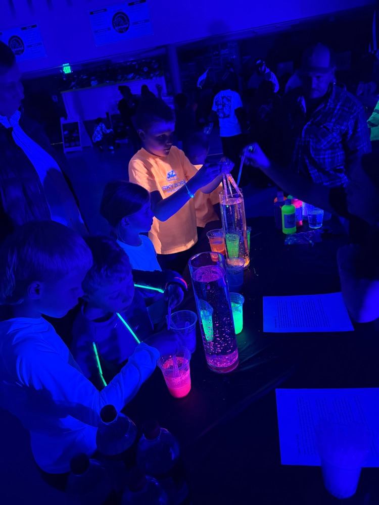students doing bioluminescence experiments