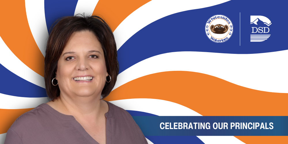 A principal in front of a wavy background with a banner that reads "Celebrating Our Principals"