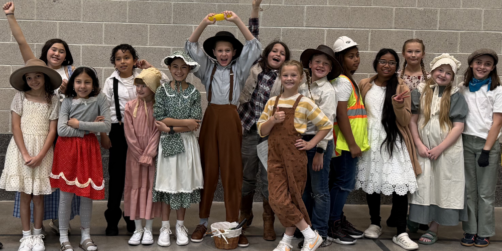 4th grade students at Bountiful Elementary dressed in varying Utah pioneer costumes as part of their Utah program