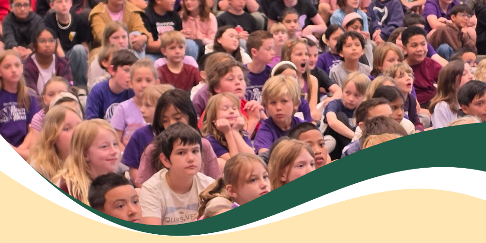 Bountiful Elementary students attend assembly for Purple Up week celebrating the month of the Military Child