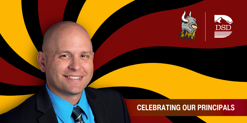 A principal in front of a wavy background with a banner that reads "Celebrating Our Principals"
