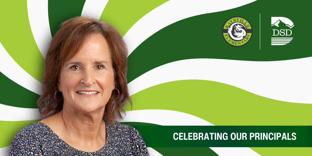 A principal in front of a wavy background with a banner that reads "Celebrating Our Principals"