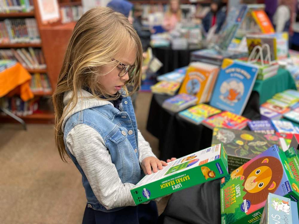 girl at a book fair