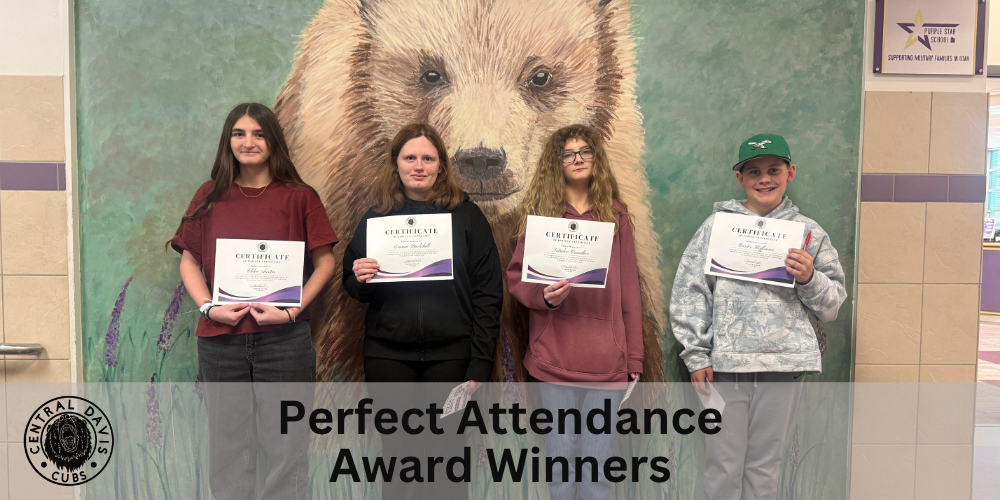 4 Students Standing Together with Awards for Perfect Attendance