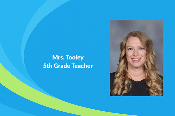 Mrs. Tooley 5th grade teacher photo of women with curled blonde ahir