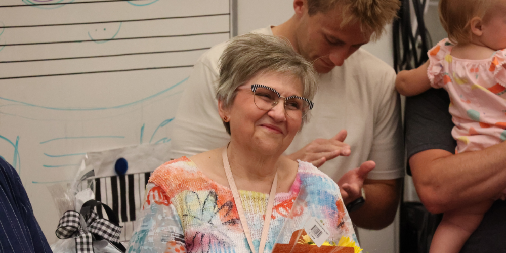 Shauna Ward smiles while receiving the lifetime achievement award