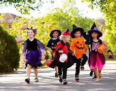 kids in Halloween costumes