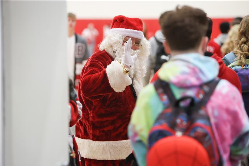 santa greeting students