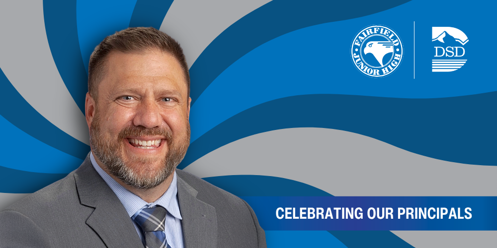 A principal in front of a wavy background with a banner that reads "Celebrating Our Principals"