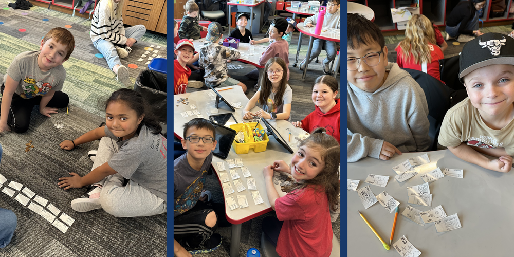 2nd graders posing with 5th graders and doing math together.