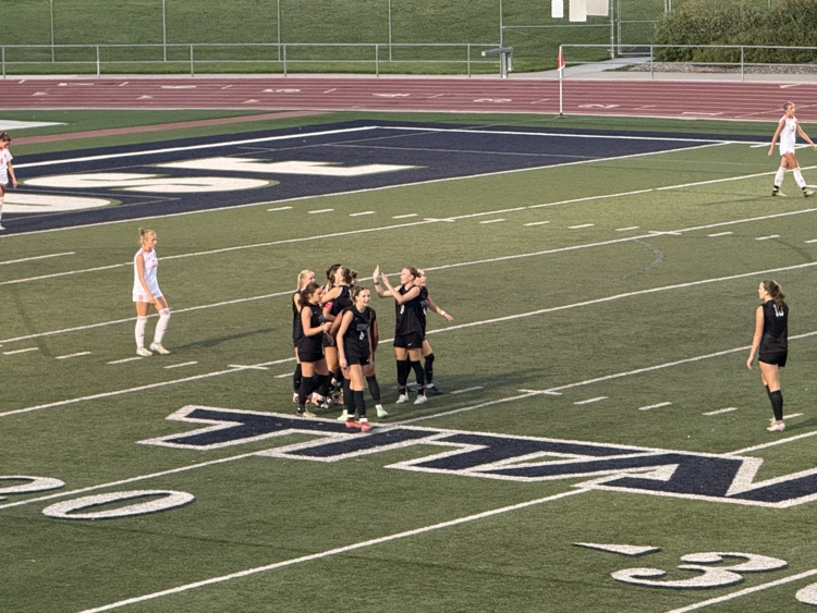 girls playing soccer