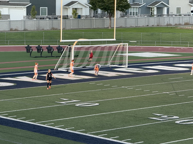 girls playing soccer