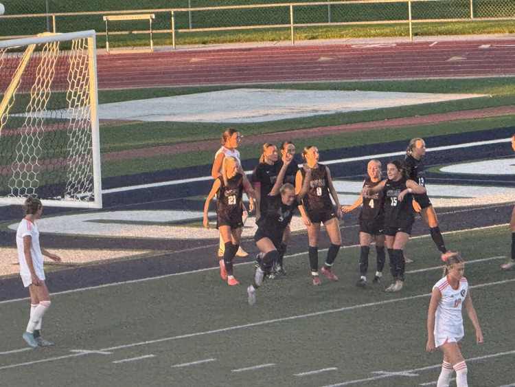 girls playing soccer
