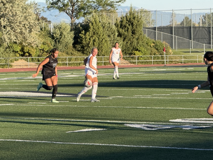 girls playing soccer