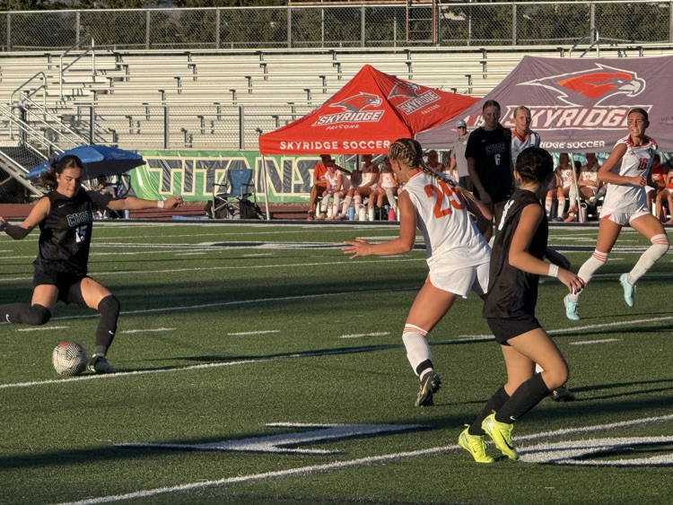 girls playing soccer