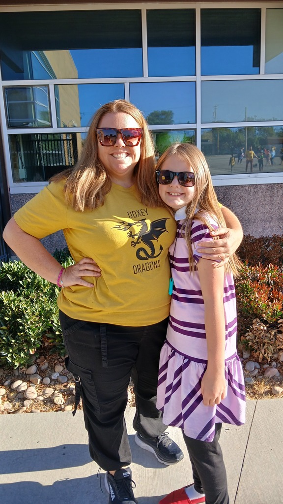 Student posing with Mrs. Barber, their teacher from last year